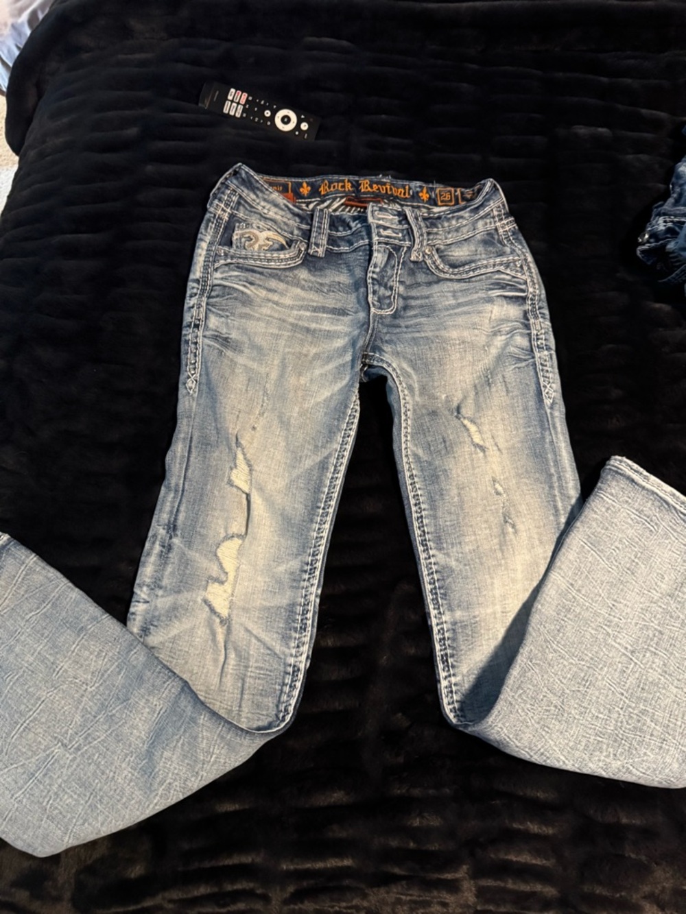 Rock Revival Women's Light Blue Bootcut Jeans with Faded Distress